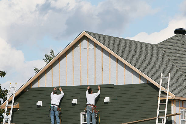 Professional Emergency Siding Repair technician working in Triangle, VA
